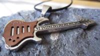 Bronze 2 tone guitar pendant on thin leather cord