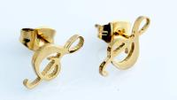 Gold treble clef note stud earrings