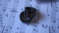 Music Note Earrings, Black  in Huggie Style