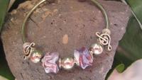 Murano glass bead and music note torc bangle