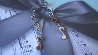 Musical Treble Clef Note Long Drop Stud Earrings.