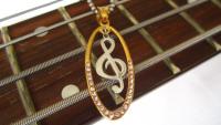 Stainless Steel 2-tone Musical Treble Note Oval Charm Clef Pendant