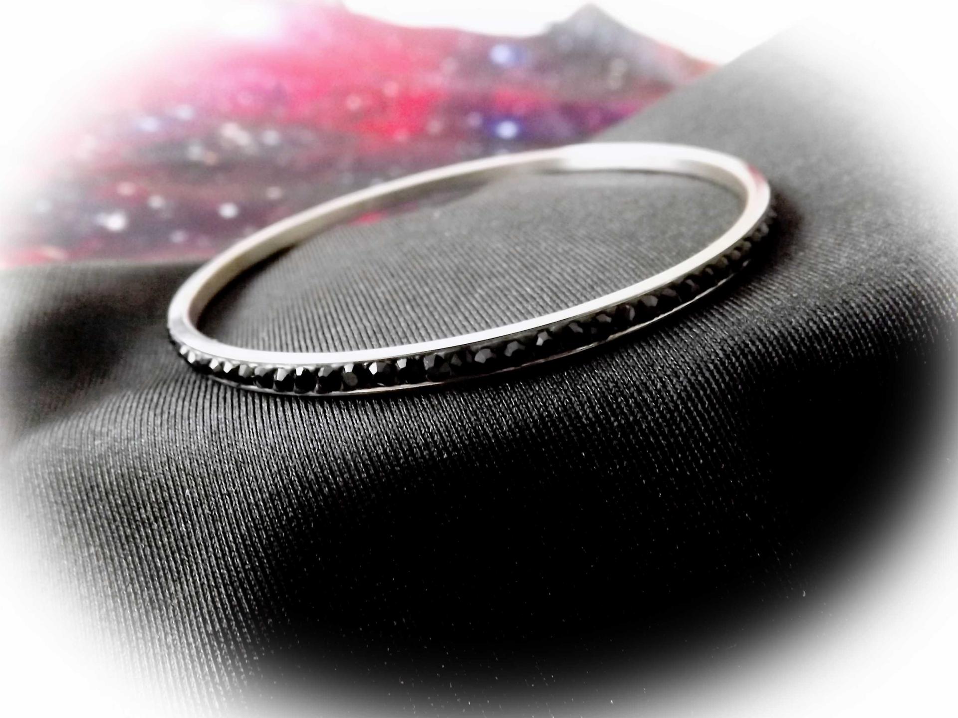 Stunning Bangle inset with black crystal stones.