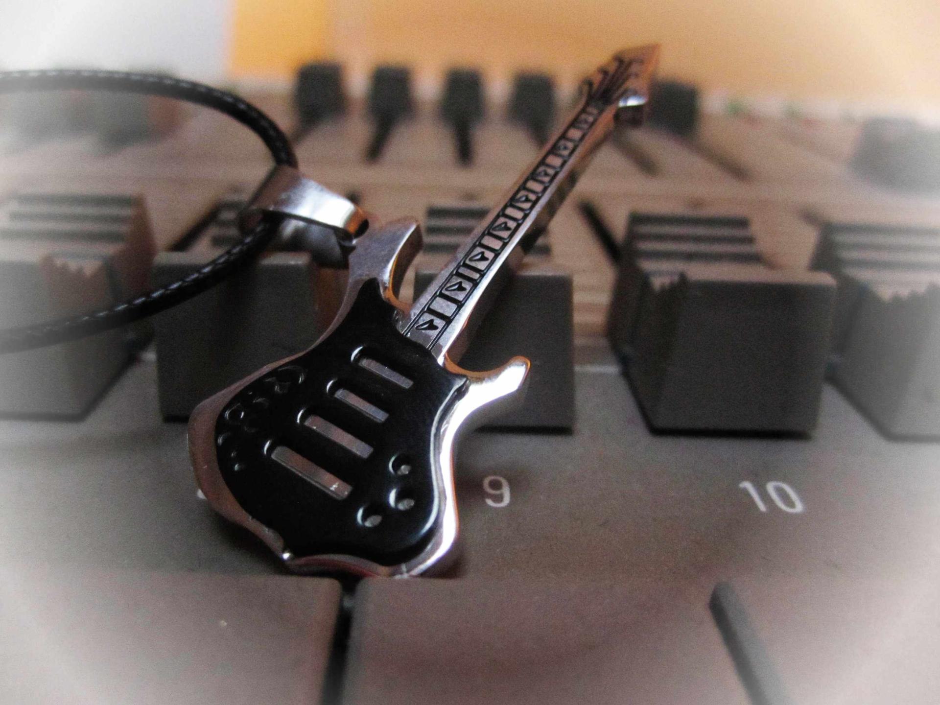 Black Guitar Pendant on thin leather cord