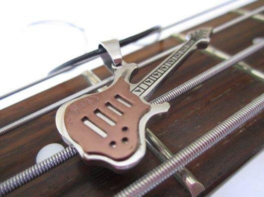 Bronze 2 tone guitar pendant on thin leather cord