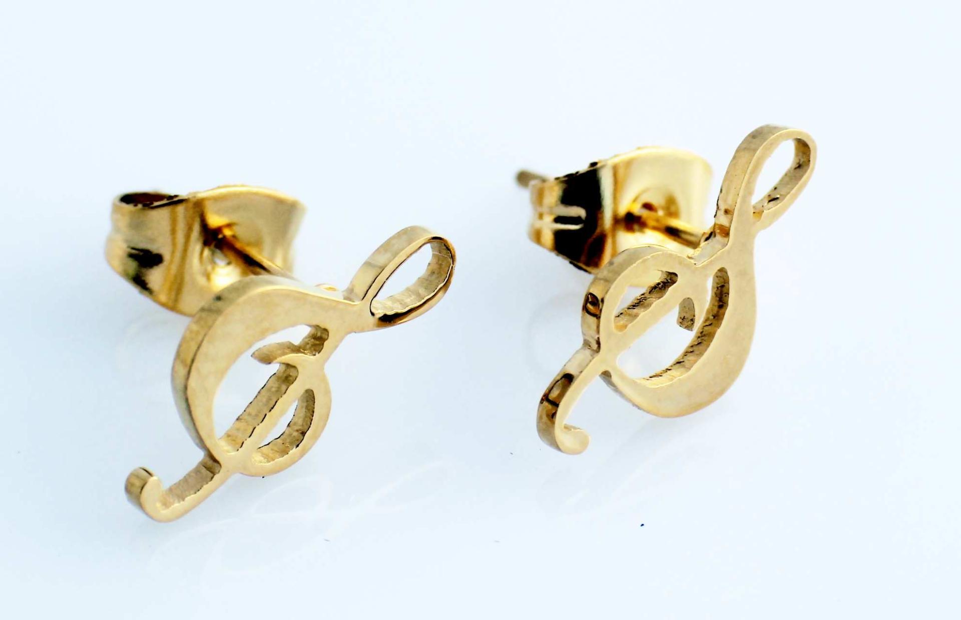 Gold treble clef note stud earrings