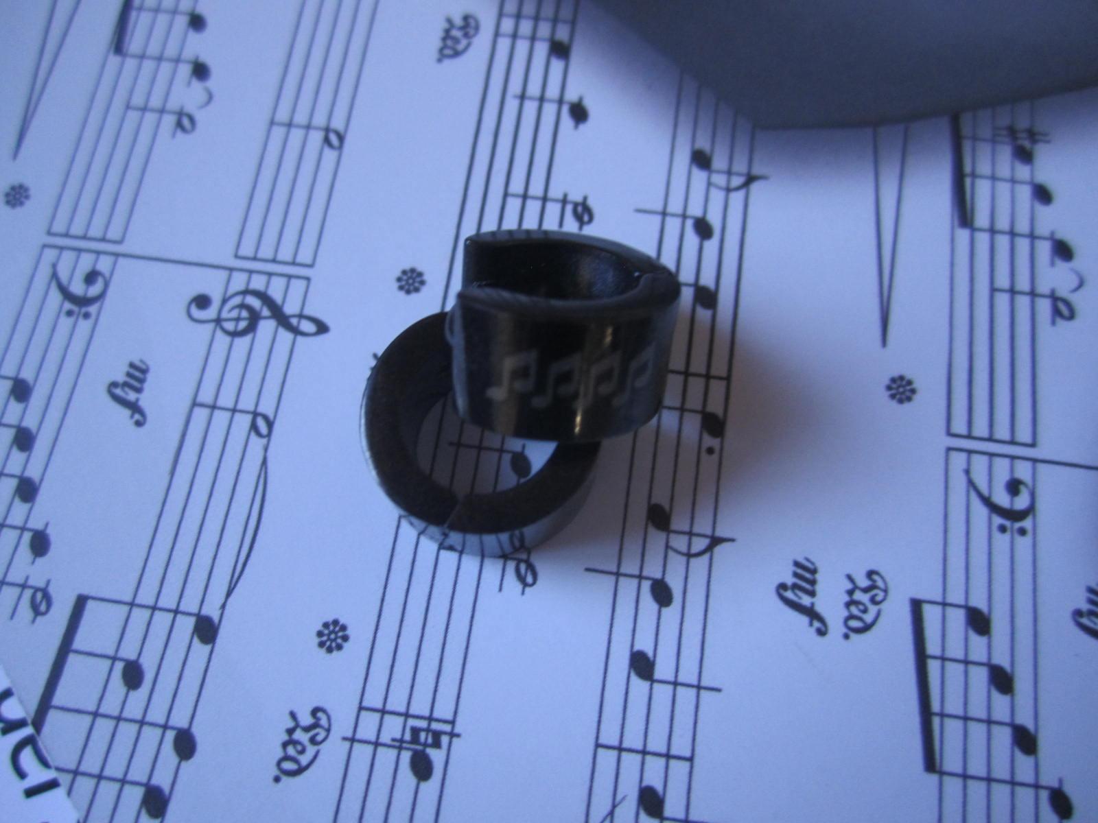 Music Note Earrings, Black  in Huggie Style