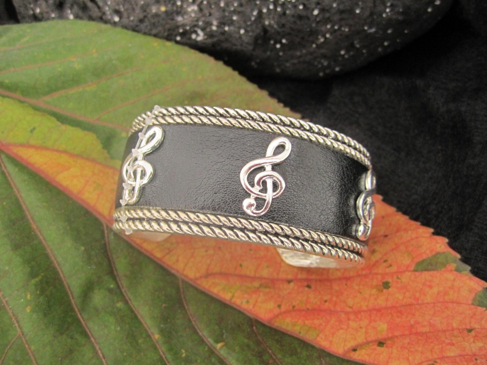 Silver and Black Leather Cuff Bangle with G Clef Design