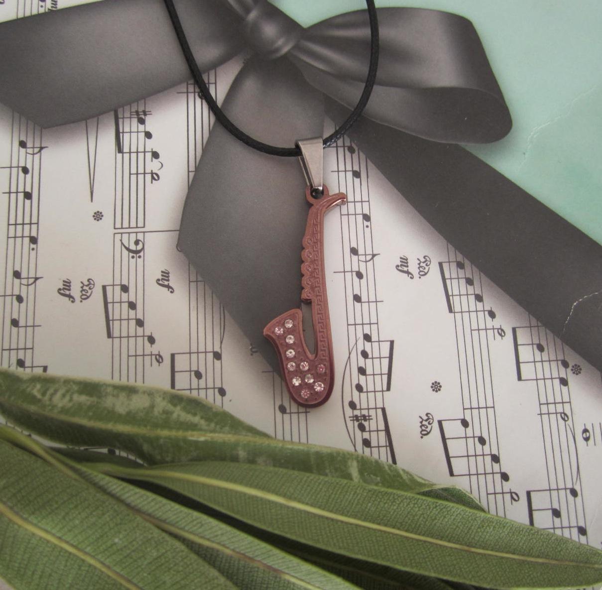 Saxophone Pendant in Bronze on thin leather cord